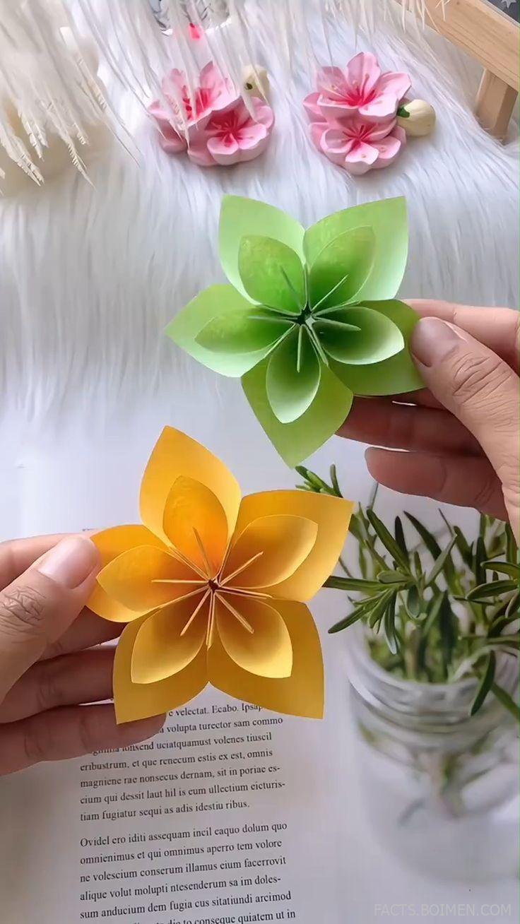 PIN TITLE: "A very simple way to fold flowers #origami" | PIN DESCRIPTION
